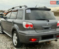 Серый Мицубиси Аутлендер, объемом двигателя 2 л и пробегом 199 тыс. км за 5999 $, фото 5 на Automoto.ua