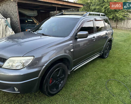 Сірий Міцубісі Аутлендер, об'ємом двигуна 2.38 л та пробігом 273 тис. км за 8000 $, фото 1 на Automoto.ua
