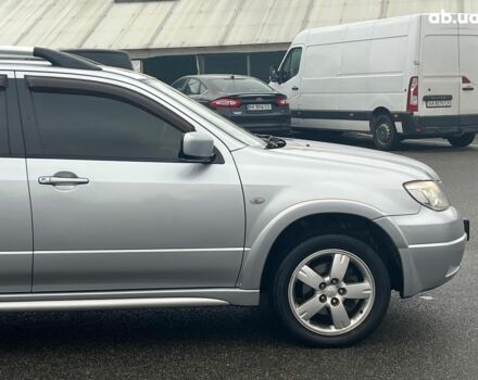 Серый Мицубиси Аутлендер, объемом двигателя 2.4 л и пробегом 324 тыс. км за 6890 $, фото 12 на Automoto.ua