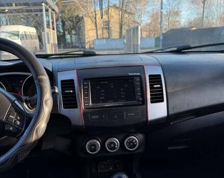 Серый Мицубиси Аутлендер, объемом двигателя 2.18 л и пробегом 287 тыс. км за 10200 $, фото 12 на Automoto.ua