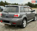 Серый Мицубиси Аутлендер, объемом двигателя 2 л и пробегом 199 тыс. км за 5999 $, фото 8 на Automoto.ua