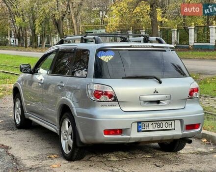 Серый Мицубиси Аутлендер, объемом двигателя 2.38 л и пробегом 170 тыс. км за 6900 $, фото 5 на Automoto.ua