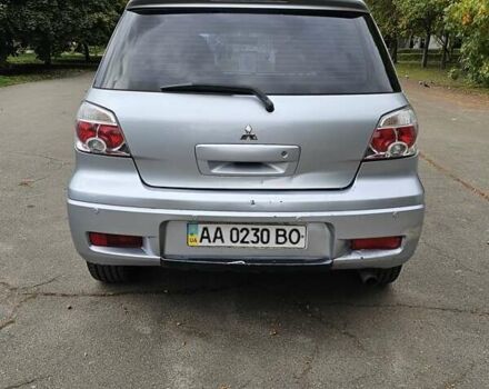 Серый Мицубиси Аутлендер, объемом двигателя 2.38 л и пробегом 200 тыс. км за 5700 $, фото 7 на Automoto.ua