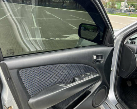 Серый Мицубиси Аутлендер, объемом двигателя 2 л и пробегом 209 тыс. км за 7200 $, фото 8 на Automoto.ua