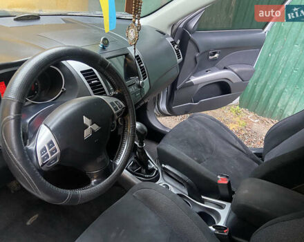 Серый Мицубиси Аутлендер, объемом двигателя 1.97 л и пробегом 229 тыс. км за 8500 $, фото 8 на Automoto.ua