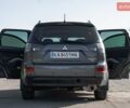 Серый Мицубиси Аутлендер, объемом двигателя 2.4 л и пробегом 280 тыс. км за 8000 $, фото 1 на Automoto.ua