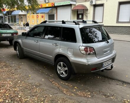 Серый Мицубиси Аутлендер, объемом двигателя 2 л и пробегом 237 тыс. км за 6000 $, фото 3 на Automoto.ua