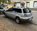 Серый Мицубиси Аутлендер, объемом двигателя 2 л и пробегом 237 тыс. км за 6000 $, фото 3 на Automoto.ua