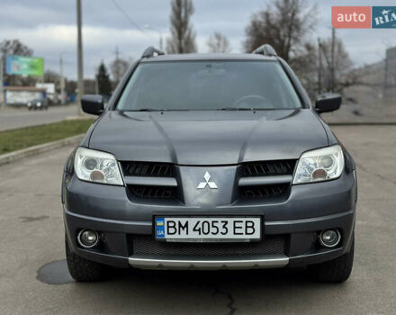 Серый Мицубиси Аутлендер, объемом двигателя 2.38 л и пробегом 254 тыс. км за 7300 $, фото 3 на Automoto.ua