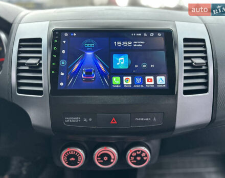 Серый Мицубиси Аутлендер, объемом двигателя 2.4 л и пробегом 61 тыс. км за 11300 $, фото 56 на Automoto.ua