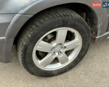 Серый Мицубиси Аутлендер, объемом двигателя 2.38 л и пробегом 254 тыс. км за 7300 $, фото 16 на Automoto.ua