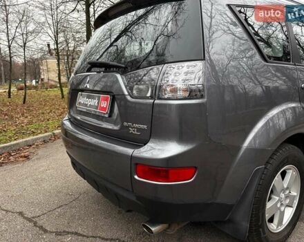 Серый Мицубиси Аутлендер, объемом двигателя 2.4 л и пробегом 237 тыс. км за 8490 $, фото 11 на Automoto.ua