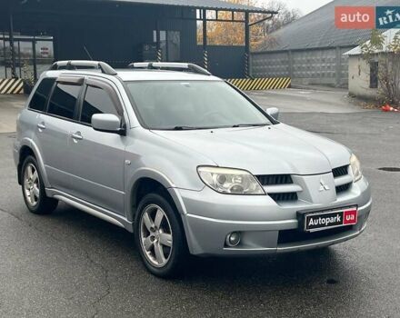 Серый Мицубиси Аутлендер, объемом двигателя 2.4 л и пробегом 324 тыс. км за 6890 $, фото 3 на Automoto.ua