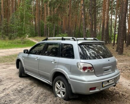 Серый Мицубиси Аутлендер, объемом двигателя 2.4 л и пробегом 225 тыс. км за 6500 $, фото 5 на Automoto.ua