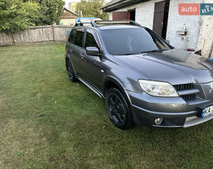Сірий Міцубісі Аутлендер, об'ємом двигуна 2.38 л та пробігом 273 тис. км за 8000 $, фото 2 на Automoto.ua