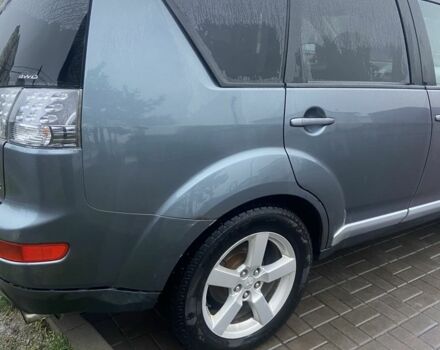 Сірий Міцубісі Аутлендер, об'ємом двигуна 2 л та пробігом 330 тис. км за 4950 $, фото 3 на Automoto.ua