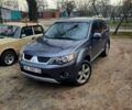 Серый Мицубиси Аутлендер, объемом двигателя 3 л и пробегом 160 тыс. км за 7500 $, фото 1 на Automoto.ua