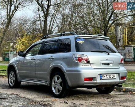 Серый Мицубиси Аутлендер, объемом двигателя 2.38 л и пробегом 170 тыс. км за 6900 $, фото 6 на Automoto.ua
