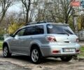 Серый Мицубиси Аутлендер, объемом двигателя 2.38 л и пробегом 170 тыс. км за 6900 $, фото 6 на Automoto.ua