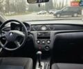 Сірий Міцубісі Аутлендер, об'ємом двигуна 2.38 л та пробігом 230 тис. км за 5700 $, фото 21 на Automoto.ua