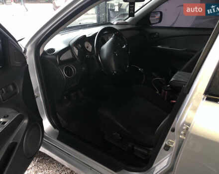 Серый Мицубиси Аутлендер, объемом двигателя 2 л и пробегом 170 тыс. км за 6950 $, фото 5 на Automoto.ua