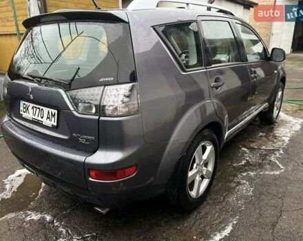 Серый Мицубиси Аутлендер, объемом двигателя 2.4 л и пробегом 238 тыс. км за 7200 $, фото 3 на Automoto.ua