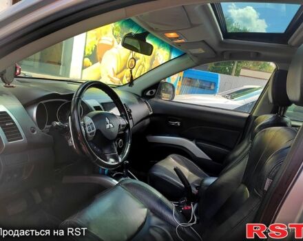 Серый Мицубиси Аутлендер, объемом двигателя 2.4 л и пробегом 216 тыс. км за 10500 $, фото 4 на Automoto.ua