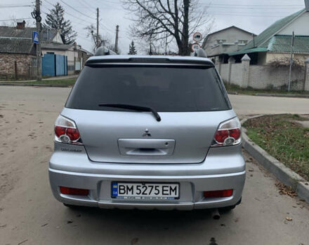 Серый Мицубиси Аутлендер, объемом двигателя 2 л и пробегом 247 тыс. км за 5999 $, фото 5 на Automoto.ua