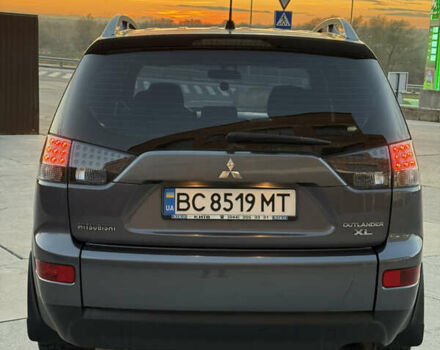 Серый Мицубиси Аутлендер, объемом двигателя 2.4 л и пробегом 210 тыс. км за 8300 $, фото 5 на Automoto.ua