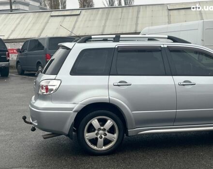 Серый Мицубиси Аутлендер, объемом двигателя 2.4 л и пробегом 324 тыс. км за 6890 $, фото 11 на Automoto.ua