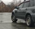 Серый Мицубиси Аутлендер, объемом двигателя 2 л и пробегом 200 тыс. км за 5999 $, фото 5 на Automoto.ua