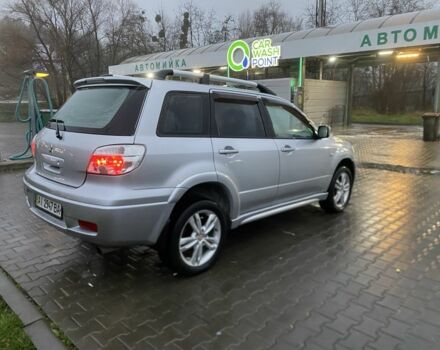 Сірий Міцубісі Аутлендер, об'ємом двигуна 2.4 л та пробігом 299 тис. км за 6300 $, фото 1 на Automoto.ua