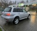 Сірий Міцубісі Аутлендер, об'ємом двигуна 2.4 л та пробігом 299 тис. км за 6300 $, фото 1 на Automoto.ua