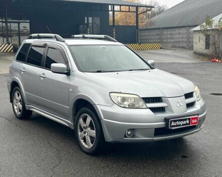Сірий Міцубісі Аутлендер, об'ємом двигуна 2.4 л та пробігом 324 тис. км за 6890 $, фото 2 на Automoto.ua