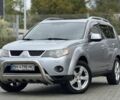 Серый Мицубиси Аутлендер, объемом двигателя 3 л и пробегом 175 тыс. км за 8500 $, фото 1 на Automoto.ua