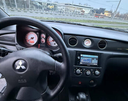 Сірий Міцубісі Аутлендер, об'ємом двигуна 2.4 л та пробігом 190 тис. км за 7500 $, фото 10 на Automoto.ua