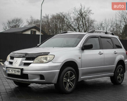 Сірий Міцубісі Аутлендер, об'ємом двигуна 2 л та пробігом 258 тис. км за 5650 $, фото 3 на Automoto.ua