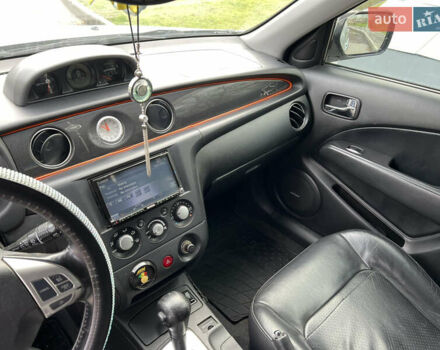 Серый Мицубиси Аутлендер, объемом двигателя 2.38 л и пробегом 197 тыс. км за 7699 $, фото 7 на Automoto.ua