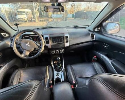 Серый Мицубиси Аутлендер, объемом двигателя 2.18 л и пробегом 287 тыс. км за 10200 $, фото 11 на Automoto.ua