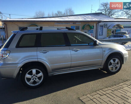 Серый Мицубиси Аутлендер, объемом двигателя 2.38 л и пробегом 191 тыс. км за 9950 $, фото 4 на Automoto.ua