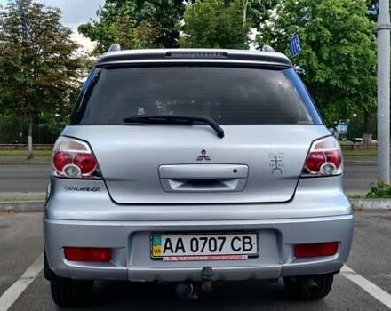 Серый Мицубиси Аутлендер, объемом двигателя 2.38 л и пробегом 323 тыс. км за 6800 $, фото 17 на Automoto.ua