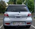 Серый Мицубиси Аутлендер, объемом двигателя 2.38 л и пробегом 323 тыс. км за 6800 $, фото 17 на Automoto.ua