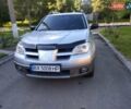 Серый Мицубиси Аутлендер, объемом двигателя 2 л и пробегом 250 тыс. км за 6700 $, фото 23 на Automoto.ua