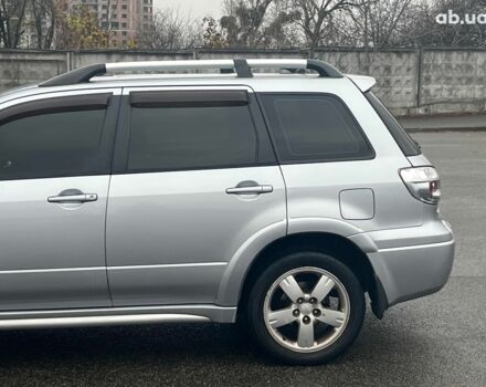 Серый Мицубиси Аутлендер, объемом двигателя 2.4 л и пробегом 324 тыс. км за 6890 $, фото 5 на Automoto.ua