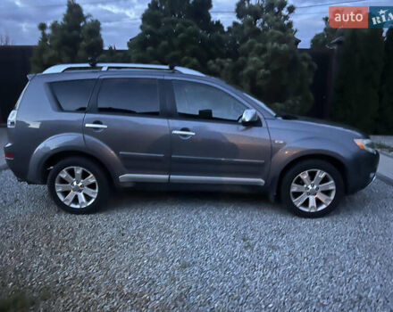 Серый Мицубиси Аутлендер, объемом двигателя 2 л и пробегом 235 тыс. км за 9000 $, фото 6 на Automoto.ua