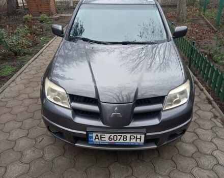 Серый Мицубиси Аутлендер, объемом двигателя 2.38 л и пробегом 143 тыс. км за 7300 $, фото 22 на Automoto.ua