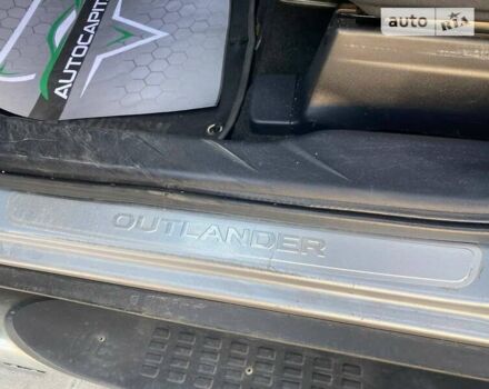 Сірий Міцубісі Аутлендер, об'ємом двигуна 2.36 л та пробігом 217 тис. км за 10190 $, фото 26 на Automoto.ua