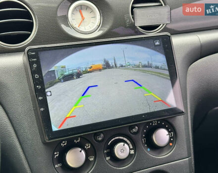 Серый Мицубиси Аутлендер, объемом двигателя 2.38 л и пробегом 254 тыс. км за 7300 $, фото 29 на Automoto.ua