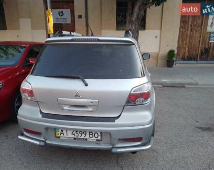 Сірий Міцубісі Аутлендер, об'ємом двигуна 2 л та пробігом 420 тис. км за 6140 $, фото 3 на Automoto.ua