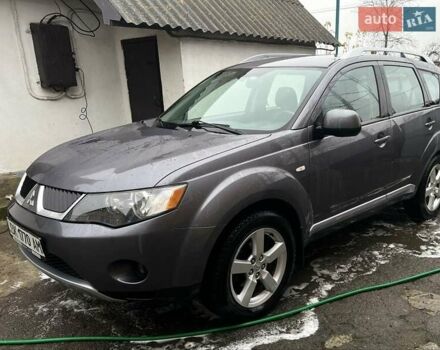 Серый Мицубиси Аутлендер, объемом двигателя 2.4 л и пробегом 238 тыс. км за 7200 $, фото 2 на Automoto.ua